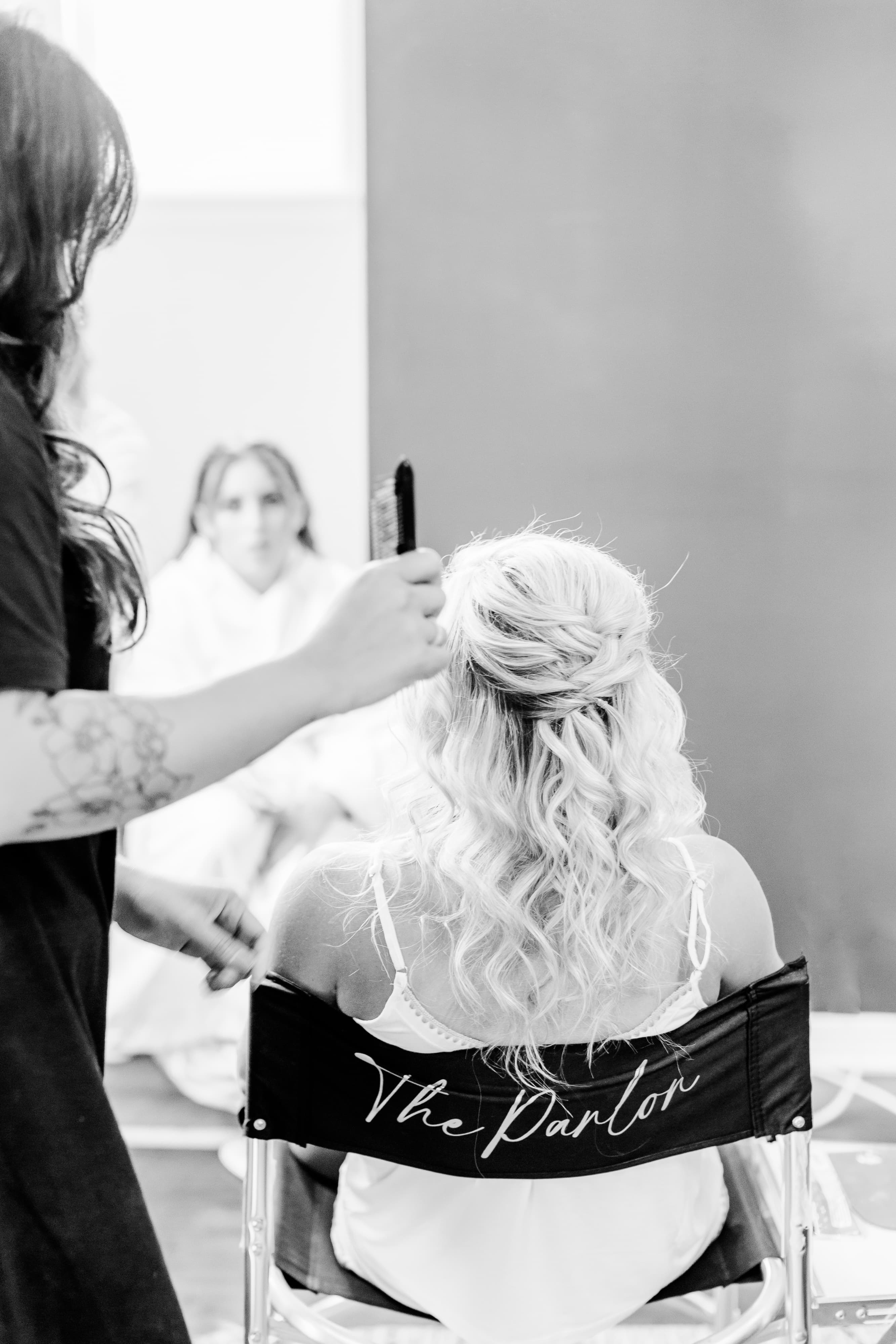 Bride with romantic bridal hair and makeup on her wedding morning