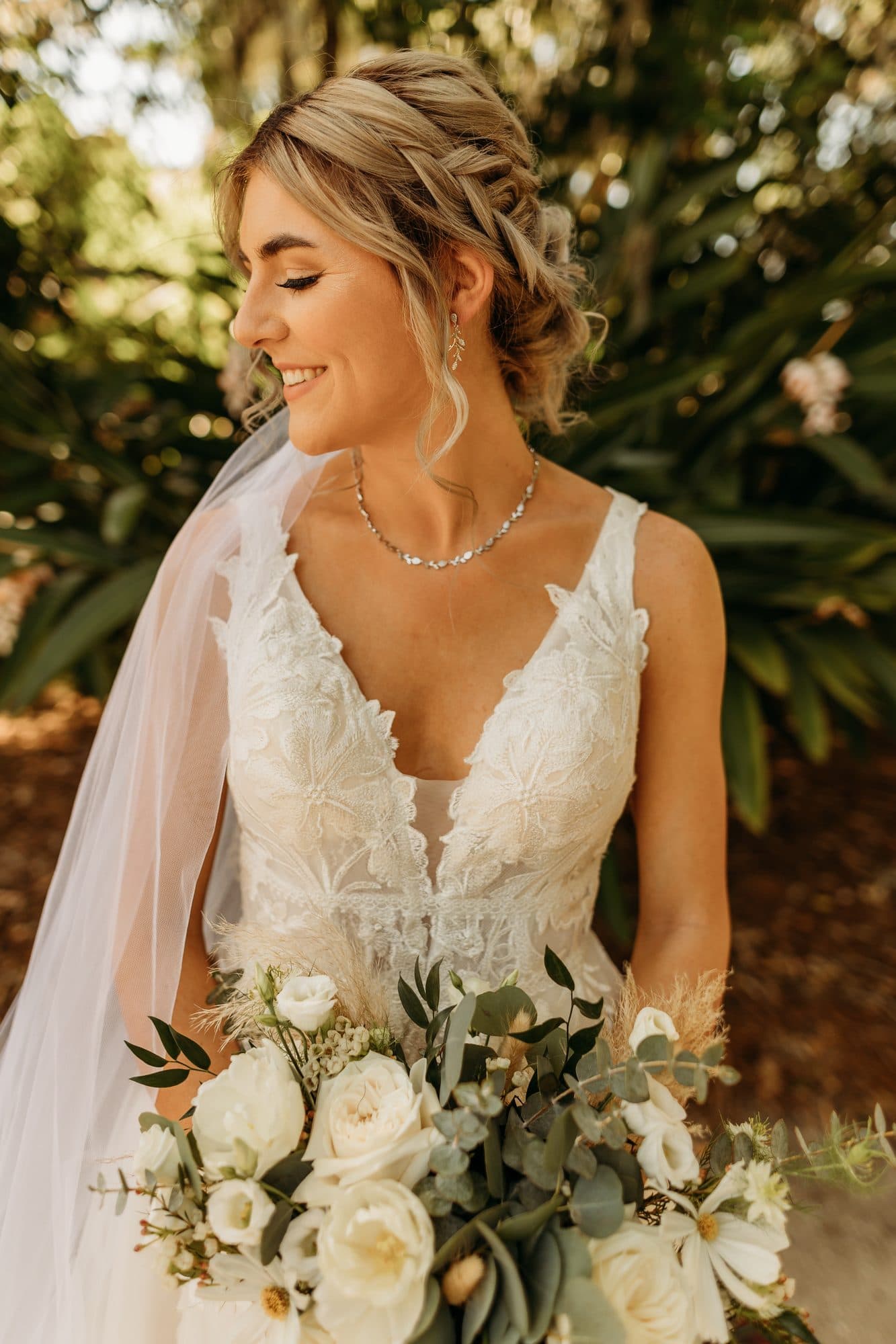 Bride photographed after hair and makeup on her wedding morning