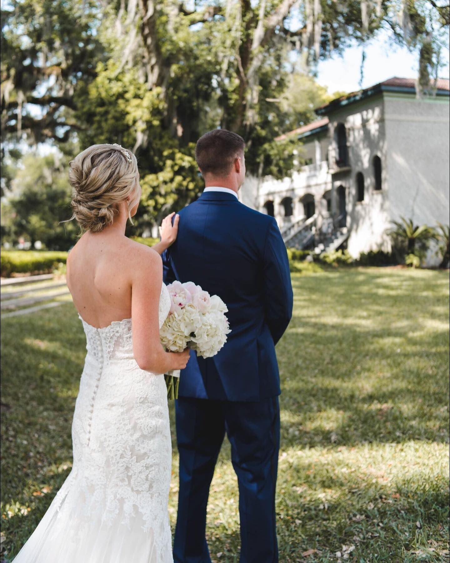 Bride with soft, romantic bridal hair and glowing natural makeup