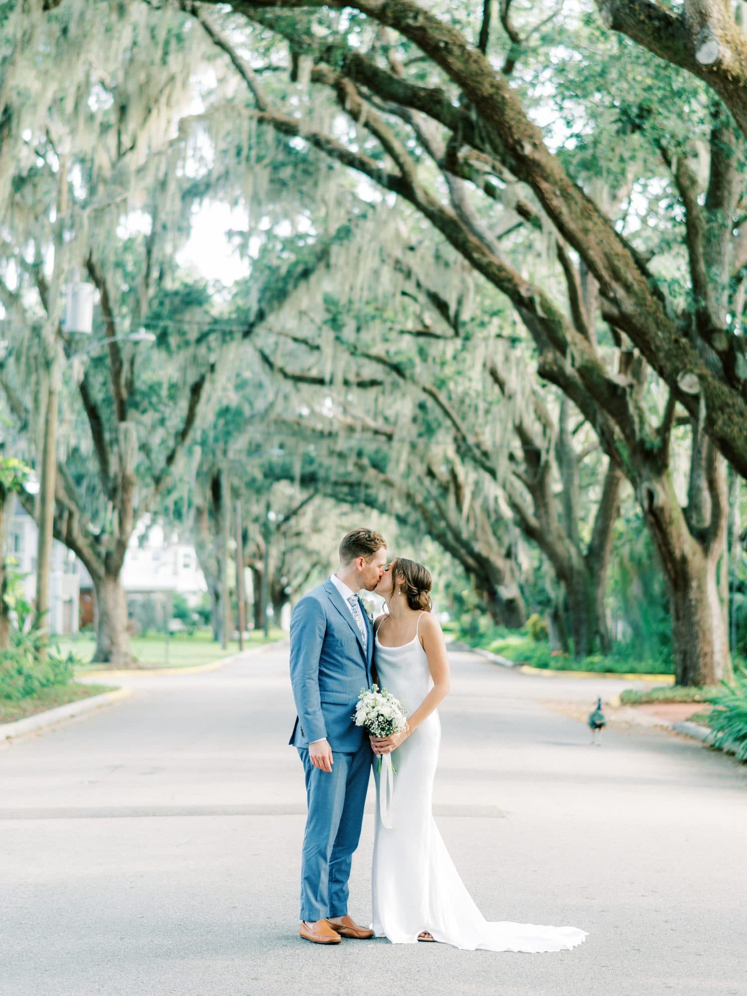 Bride with an elegant styled updo and radiant wedding makeup