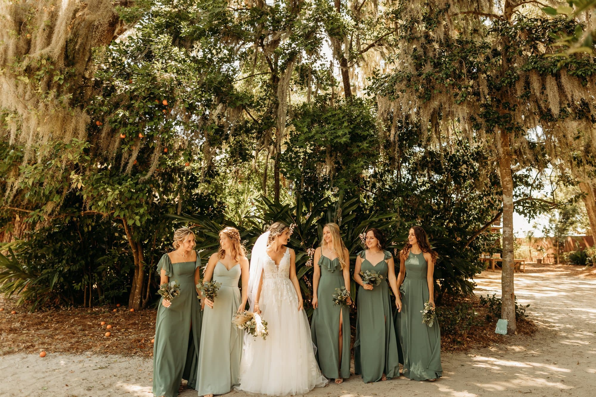 Bridesmaids with coordinated wedding-day hair and makeup