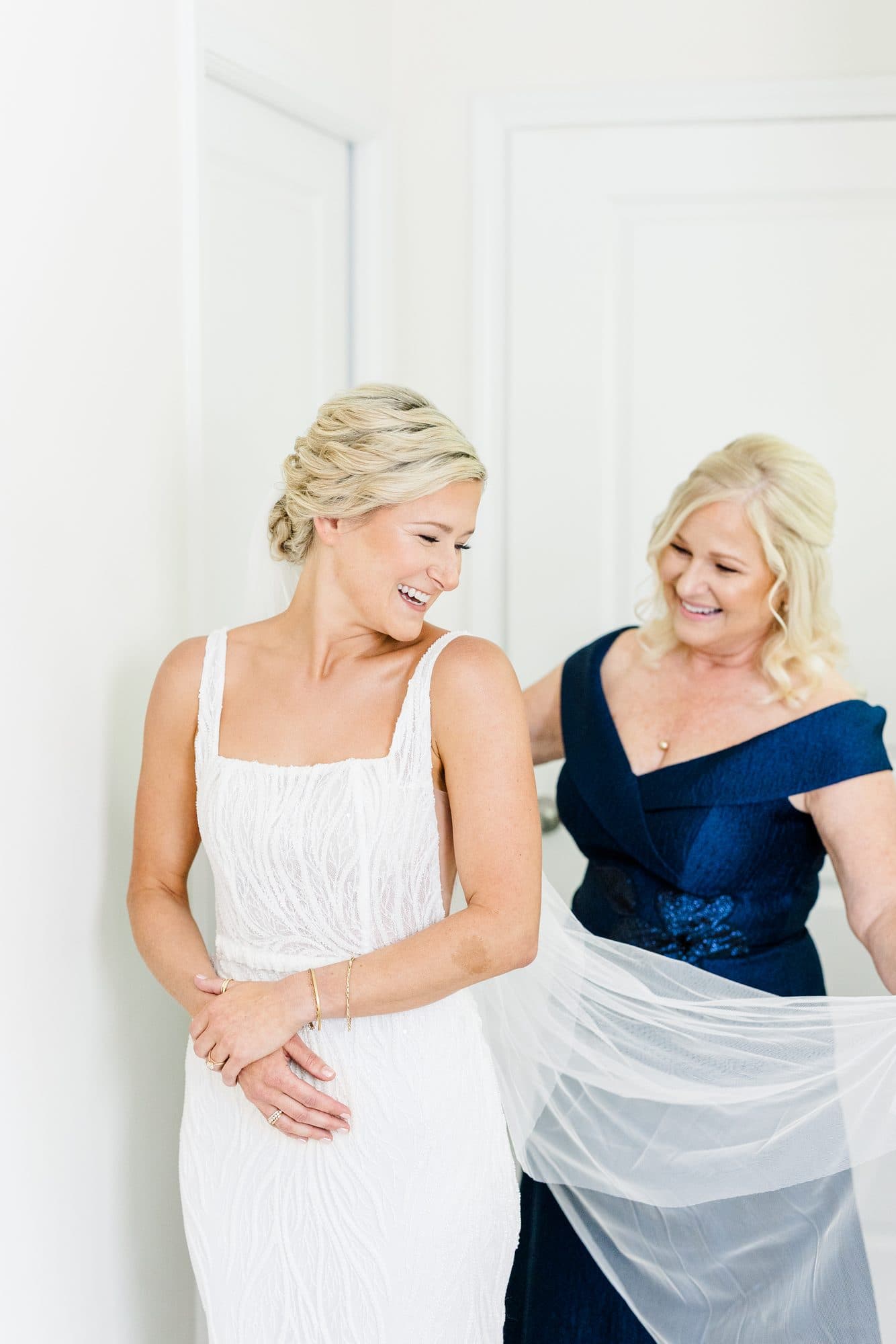 Bride Caleigh getting ready on her wedding morning