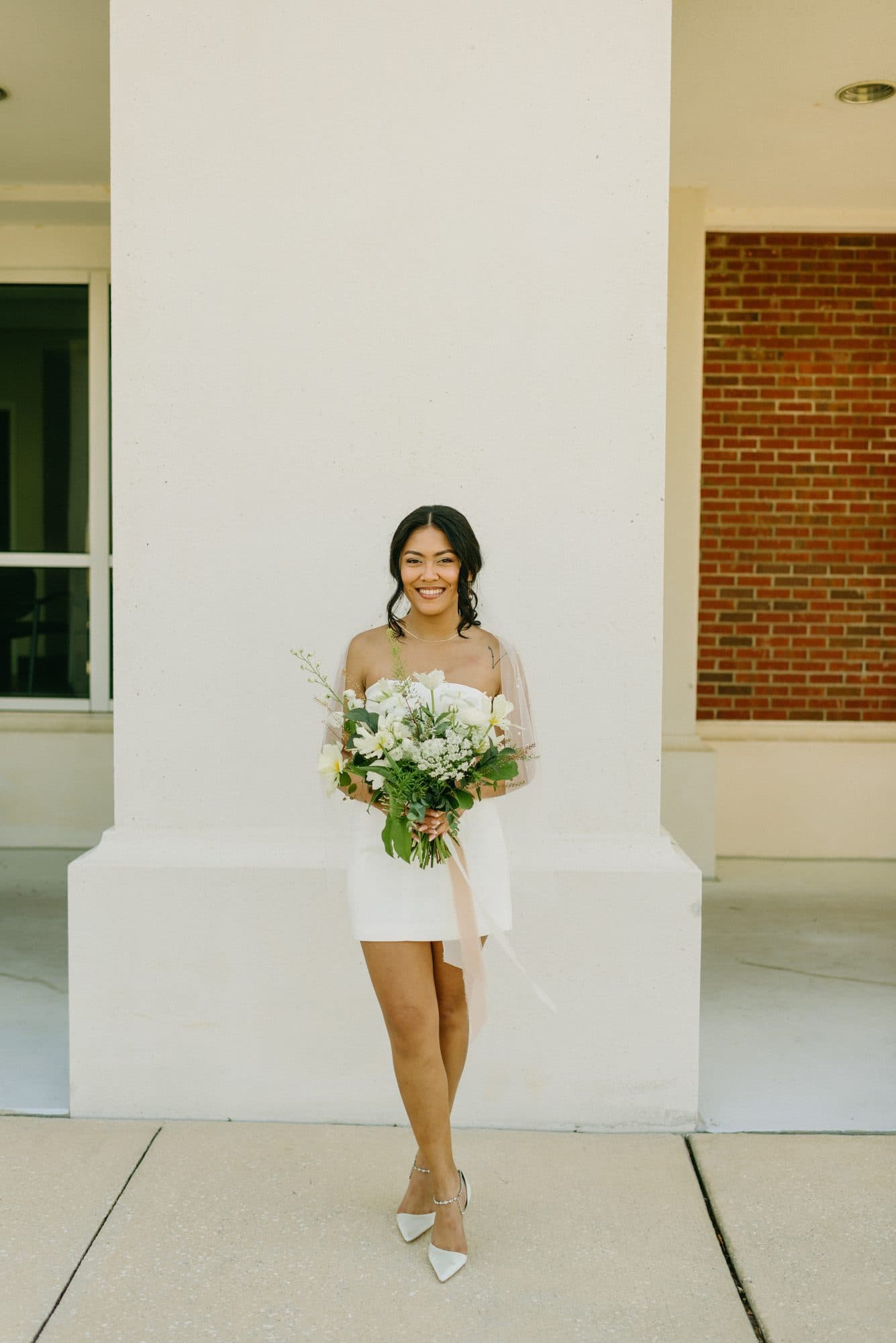 Wind-tested elopement hairstyle and long-wear bridal makeup