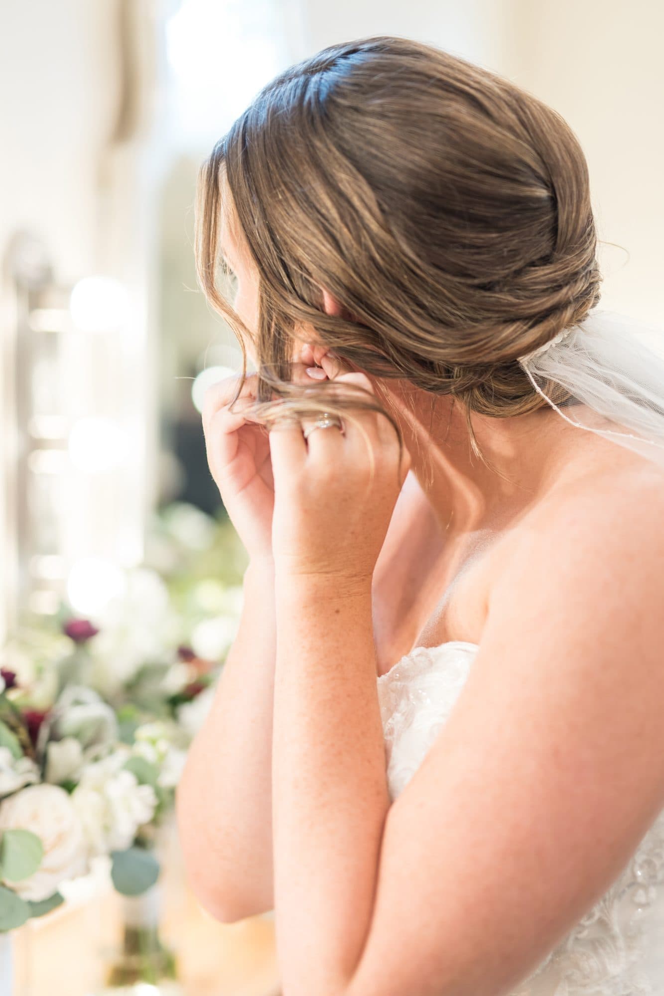 Bridal hair styling in progress on the morning of the wedding